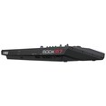 Side view of the MODX M7 showcasing its logo. The sleek design stands out with a refined presence.
